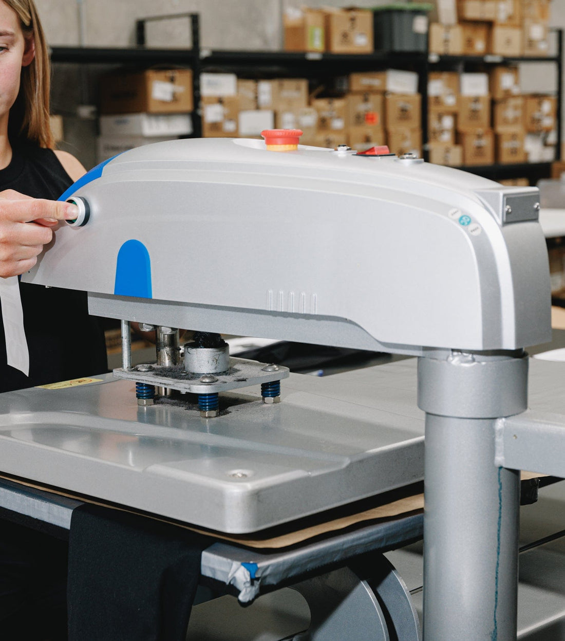 Heat press applying a Direct To Film print onto a garment for apparel printing